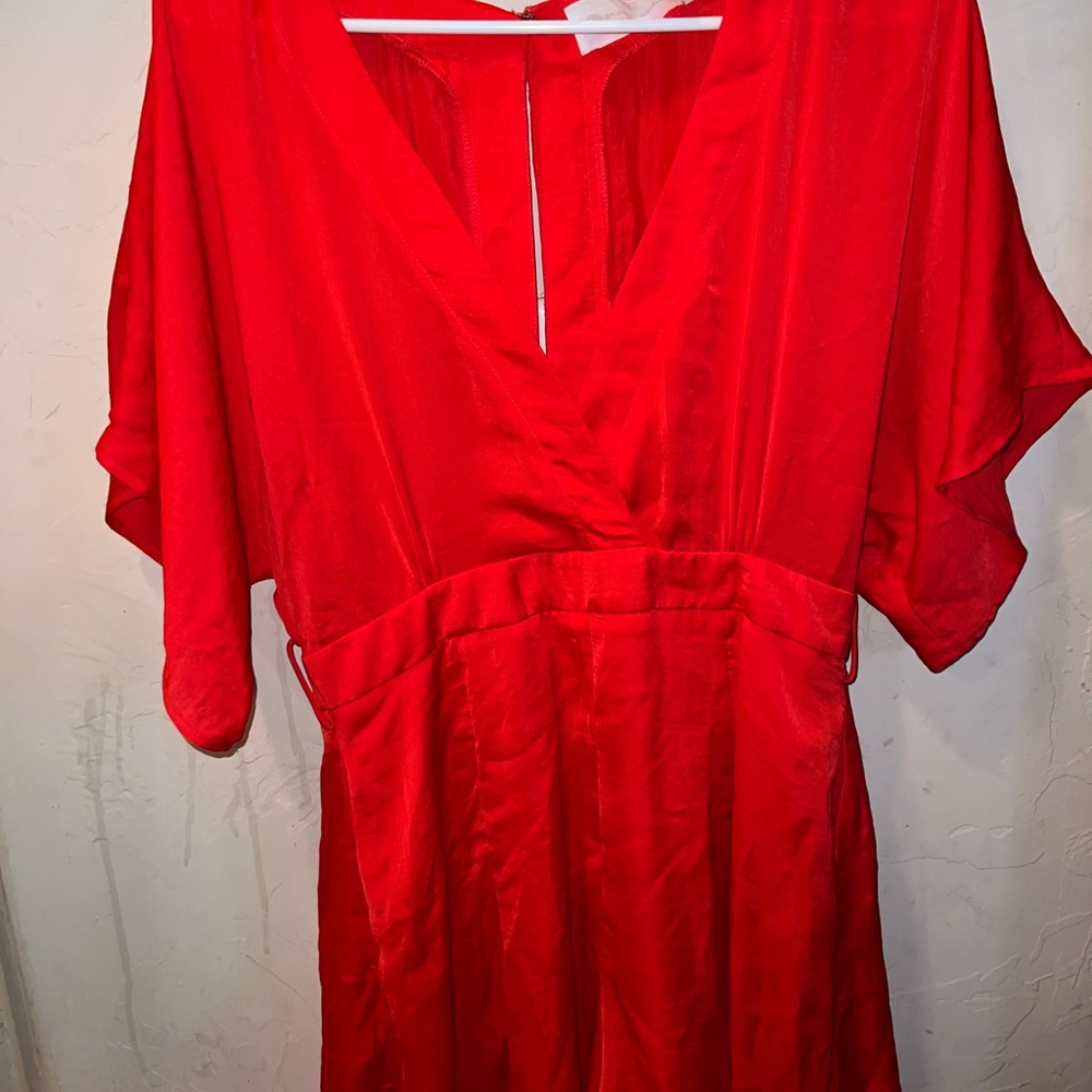 Beautiful satin v neck  open back romper